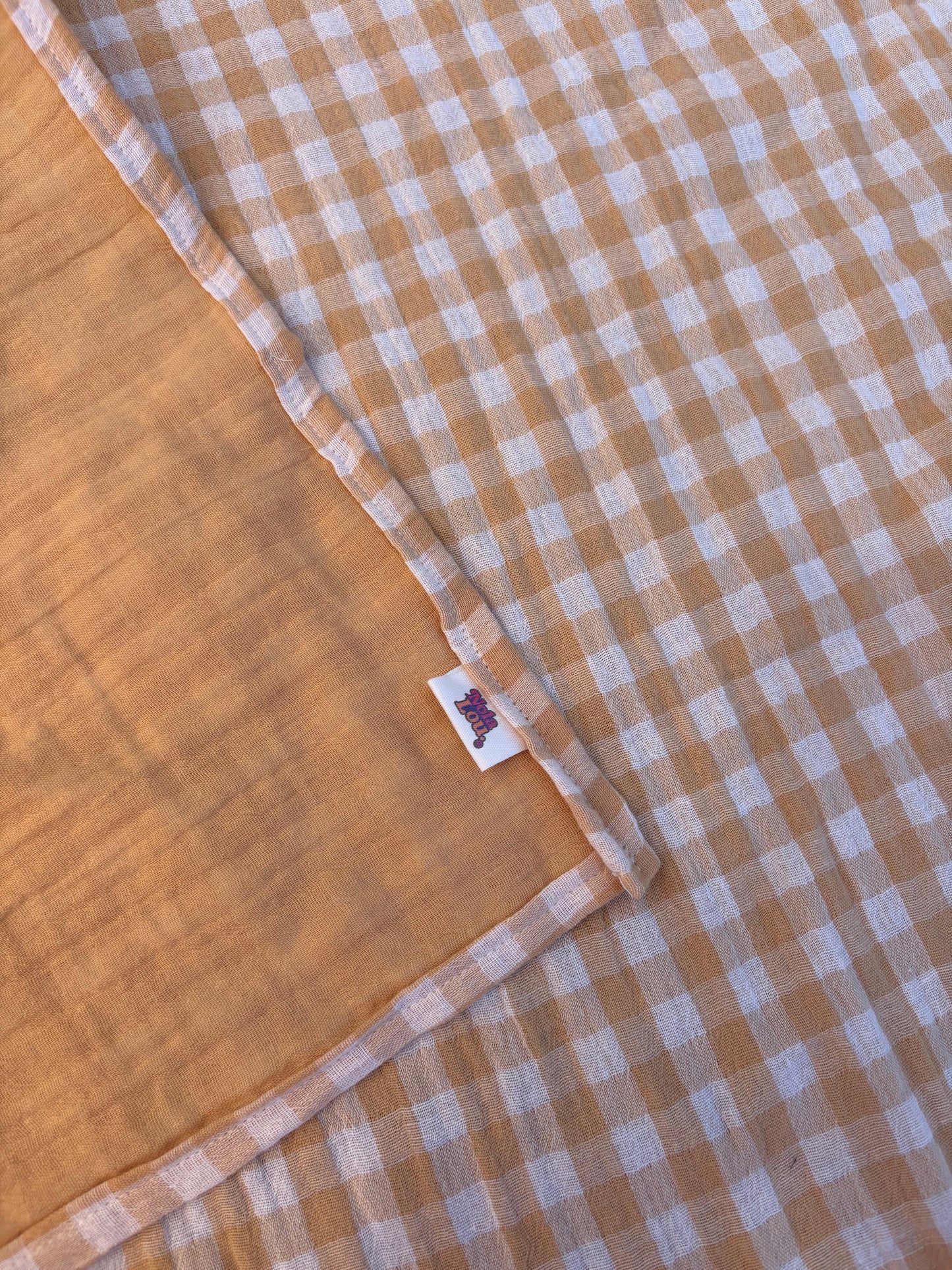Swaddle XL - Geel geblokt, met effen gele achterkant.