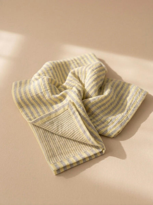 Swaddle XL - Blauw, geel gestreept.